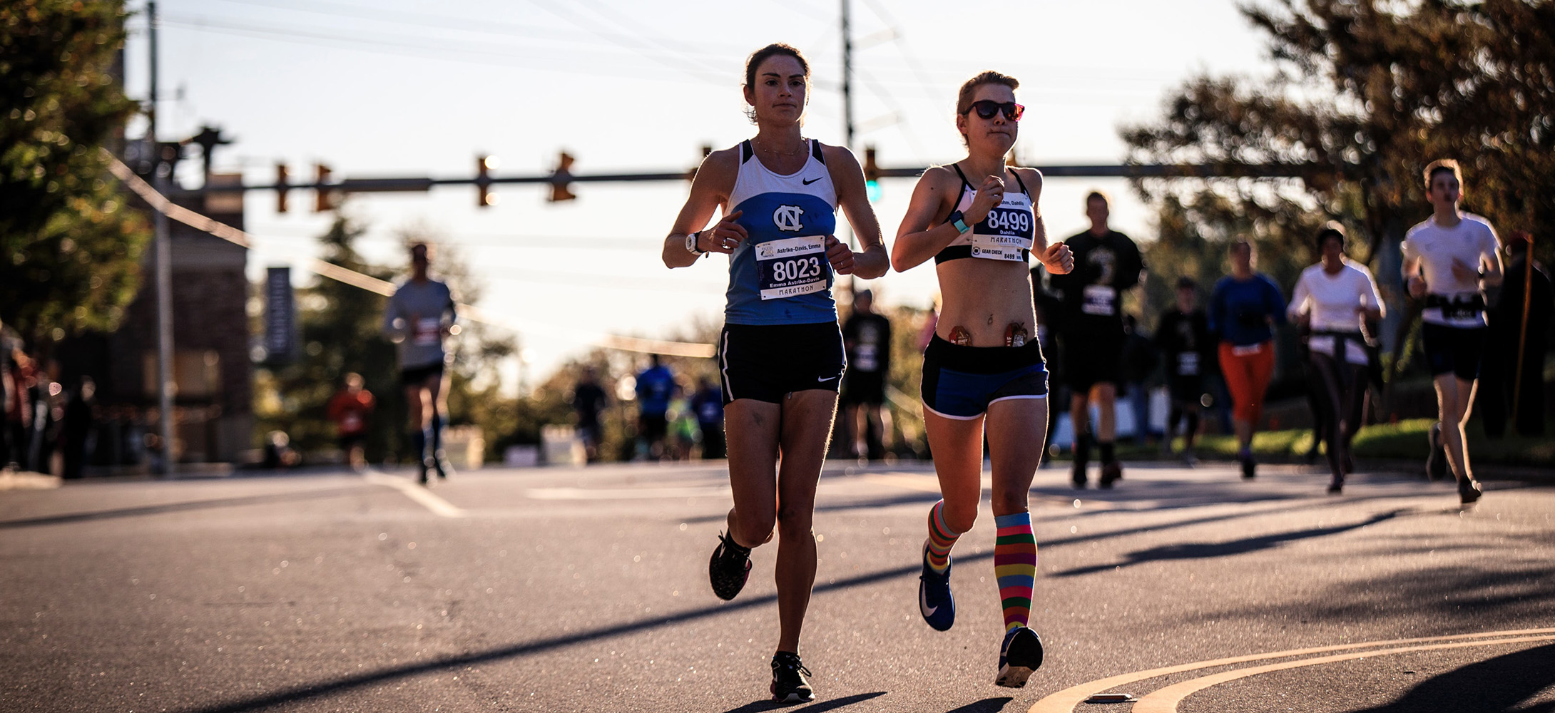 Two people running in a marathon 
