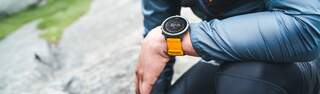 Someone wearing a Suunto watch.