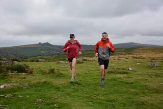 Jen & Sim Benson are trail running.