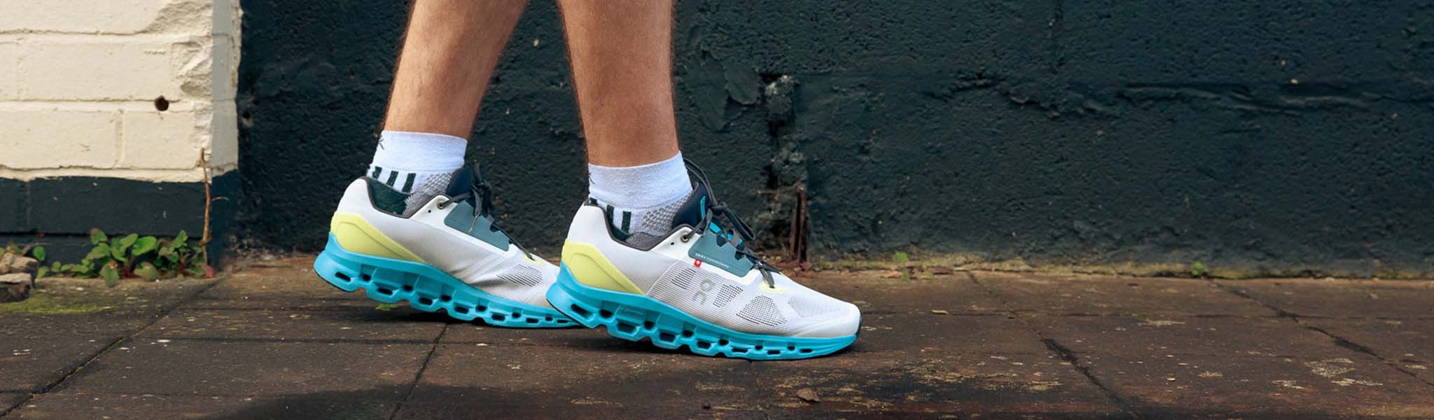 On running shoes on someone's feet 