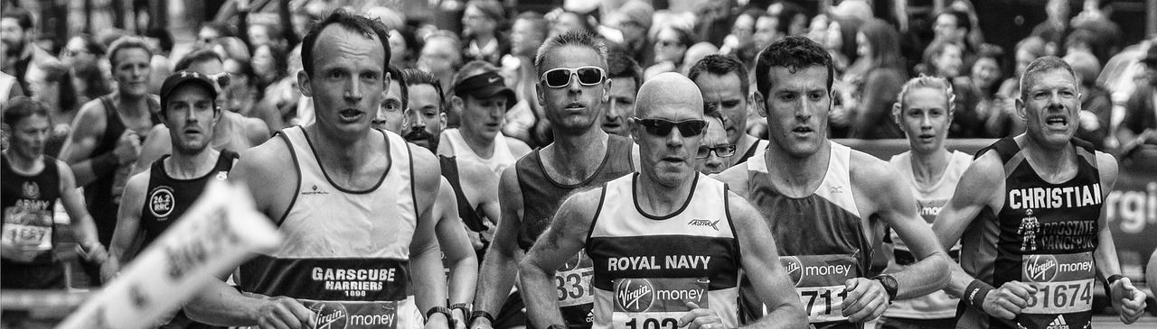 A group of people running in the London Marathon