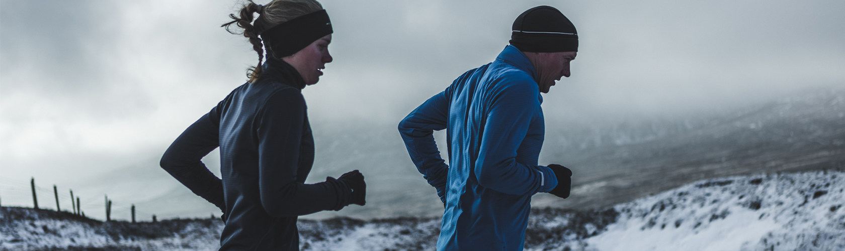 Friends running in the winter
