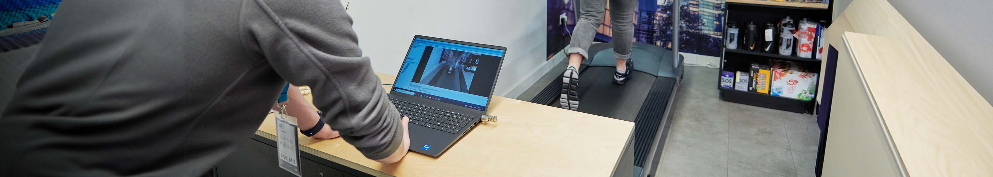 Our In Store Expert Services. An image of an expert helping a customer with a gait analysis