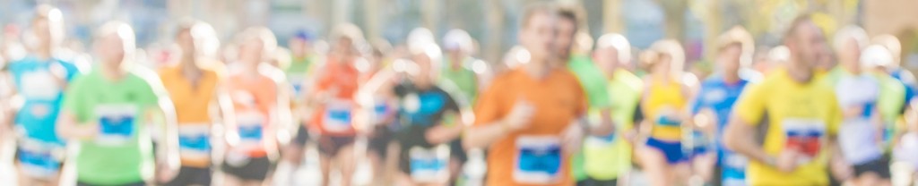 An image of a group of people racing in a 10k race 