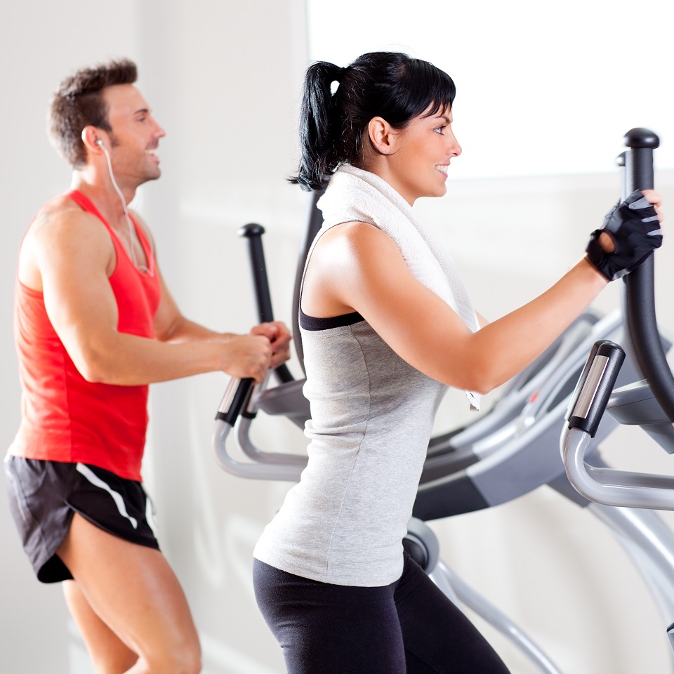 People on the crosstrainer in the gym 