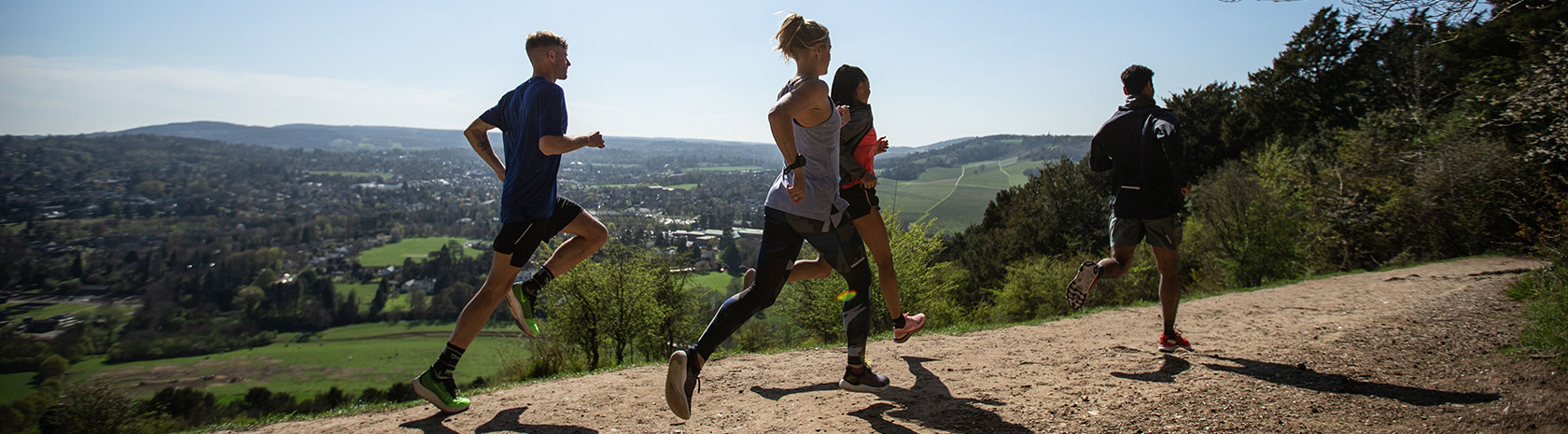 Group of people running outside