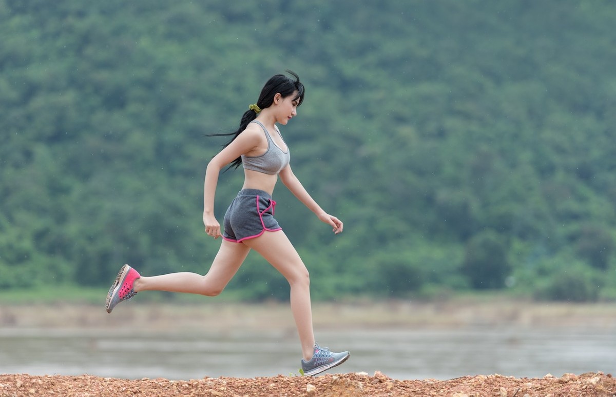 A person running in their GTX running shoes