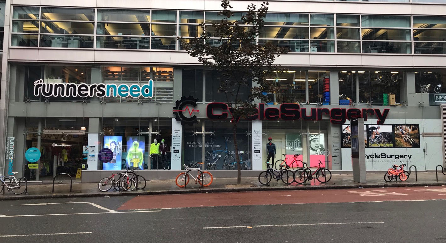 white nike with red check