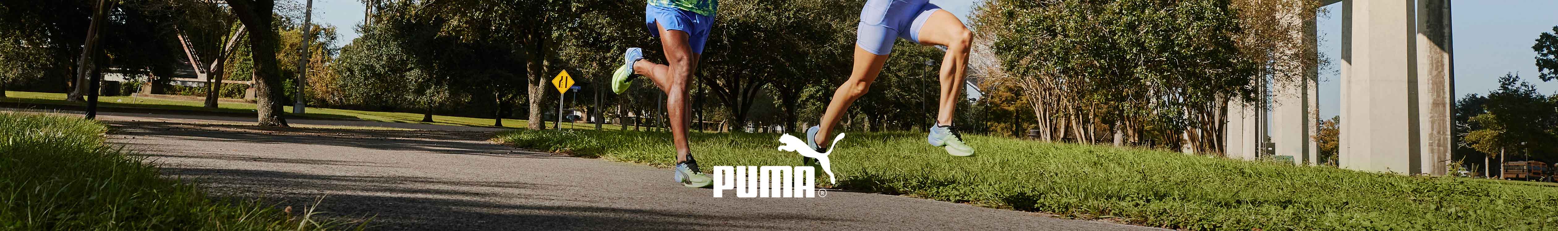 Puma header. Two people running in Puma shoes and clothes 