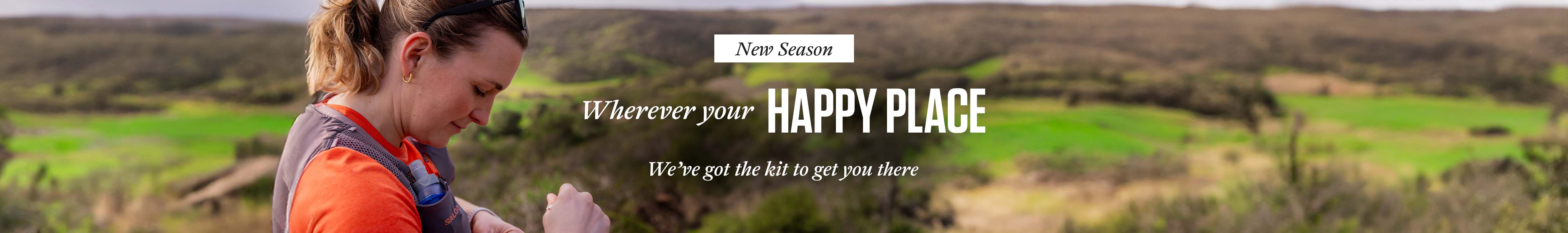 Shop new season running gear. A woman on the trail adjusting her running backpack