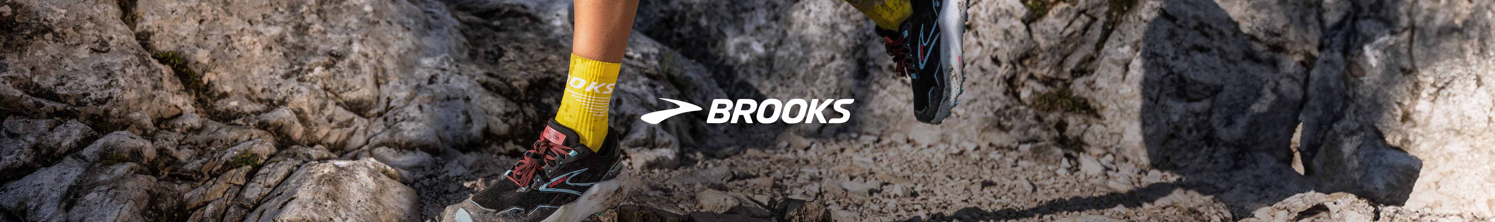 Brooks header. A person running in their Caldera shoes