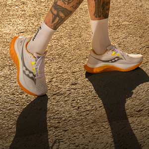 Shop race shoes. Two people standing on a road
