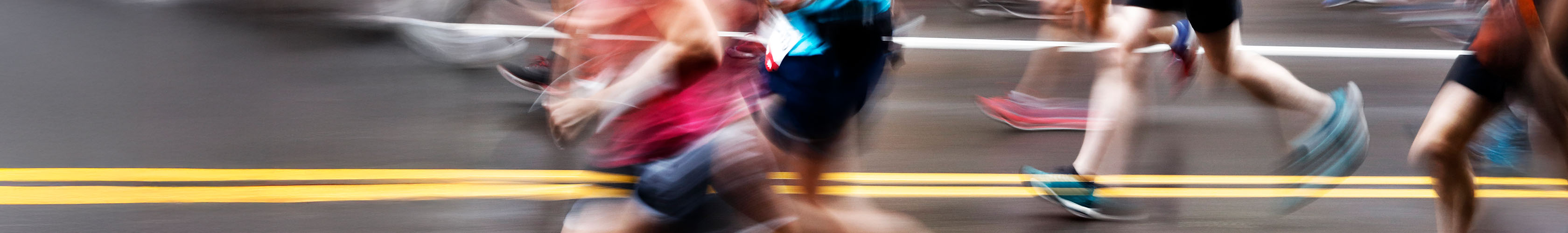 Shop marathon essentials. Group of runners in the street