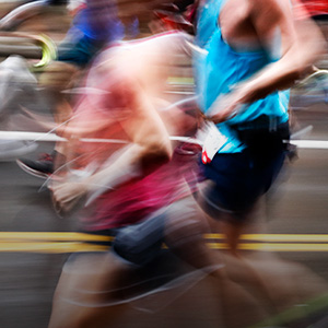 Shop marathon essentials. Group of runners in the street