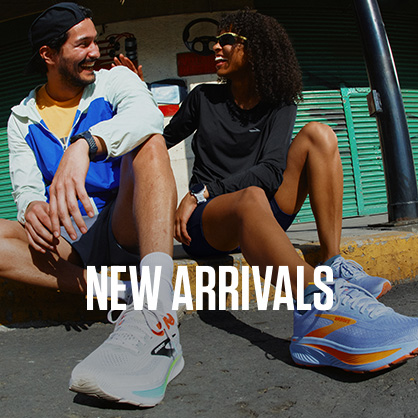 Shop new arrivals on Runners need. Two people in running shoes sitting on the edge of the road