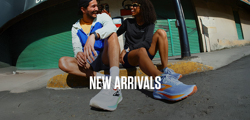 Shop new arrivals on Runners need. Two people in running shoes sitting on the edge of the road