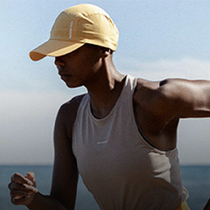 Shop running caps, A runner wearing yellow running cap