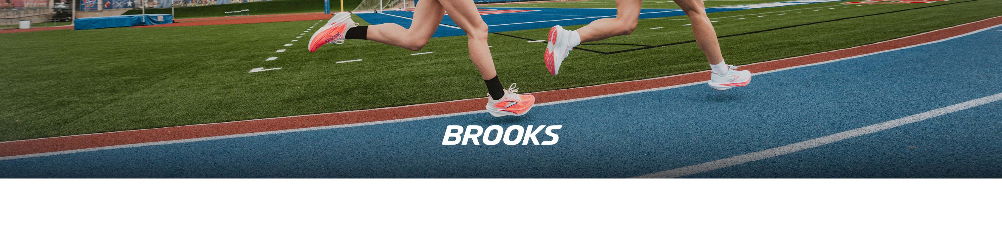 Shop Brooks Hyperion Max3. Two runners on running track