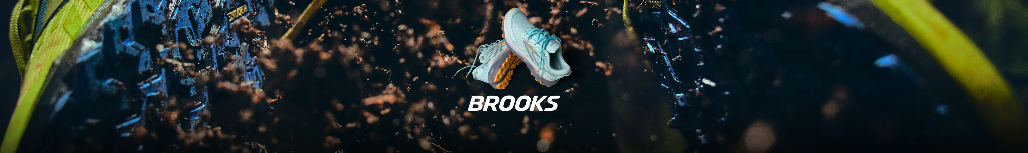 Shop Brooks Cascadia 19. A pair of Brooka Cascadia running shoes on an abstract background