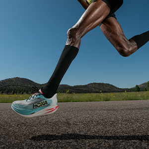 Shop race running shoes. A runner on a road