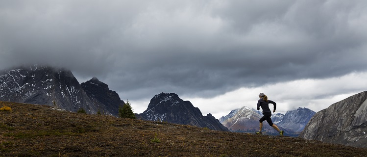 A person running in their GTX running shoes