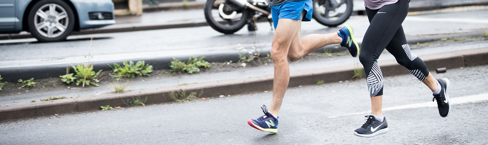 People training for their marathon in their running shoes 